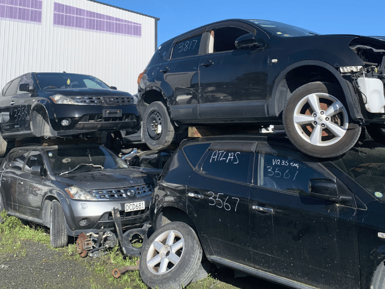 A wrecked car being dismantled at Car Wreckers Cambridge by Atlas Auto.