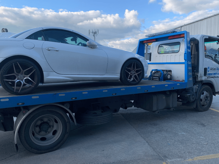 Car wreckers from Atlas Auto removing parts from vehicles at Putaruru location