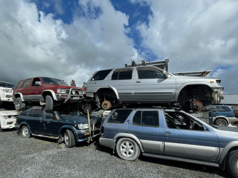 A pile of wrecked cars at Car Wreckers Taupo by Atlas Auto.